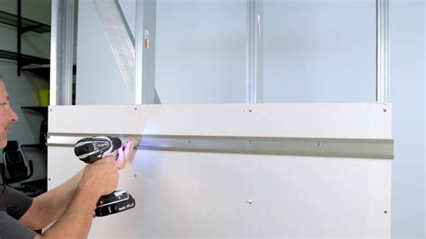 hanging cabinets on steel studs|screwing into metal studs.